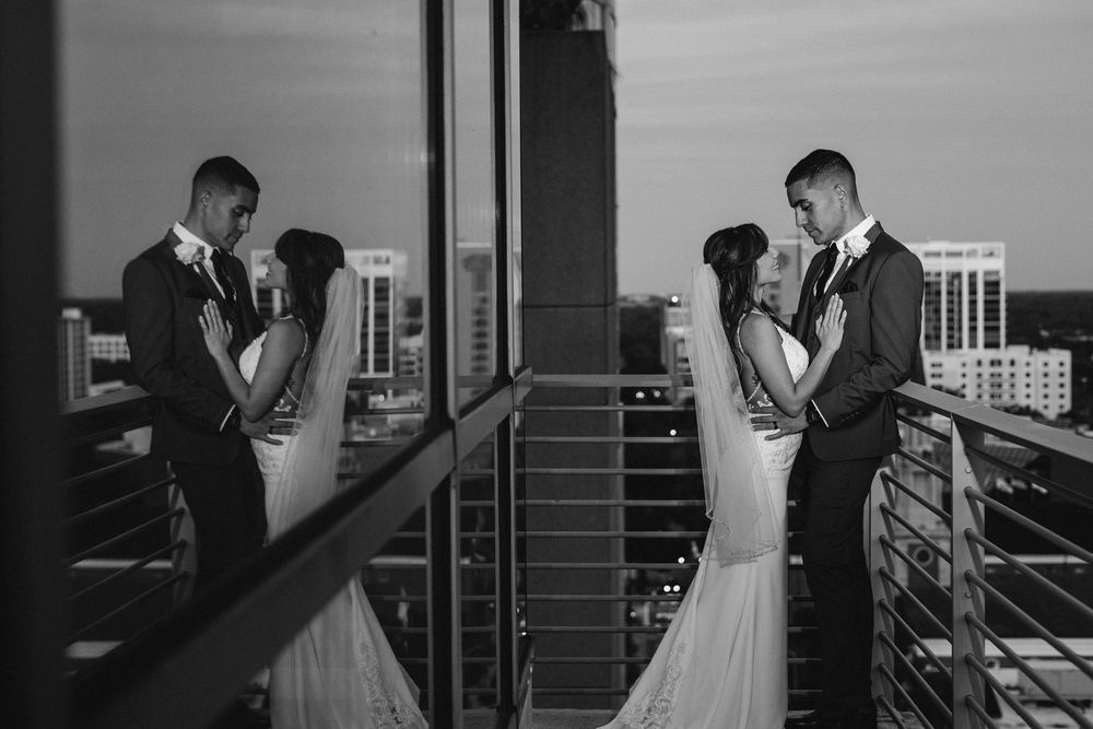 Romantic black and white wedding portraits captured in an urban setting. Orlando wedding photographer.