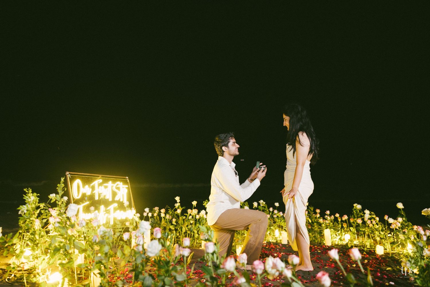 Romantic nighttime wedding photos with glowing string lights, beautifully captured by a professional wedding photographer in Mumbai.