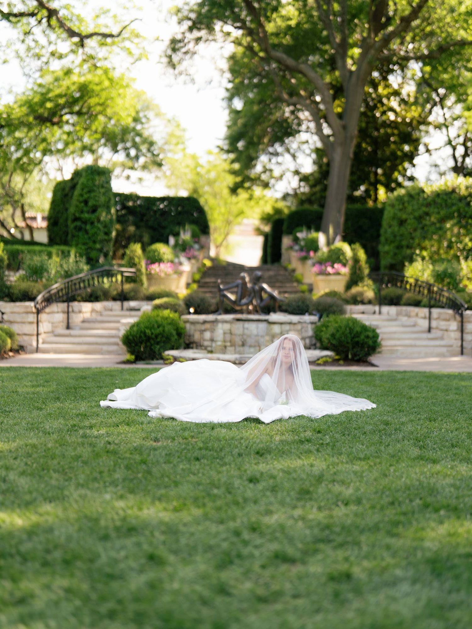 A stunning editorial portrait of a bride at the Dallas Arboretum and Botanical Gardens. 
Photo by Katelynn Davis Media