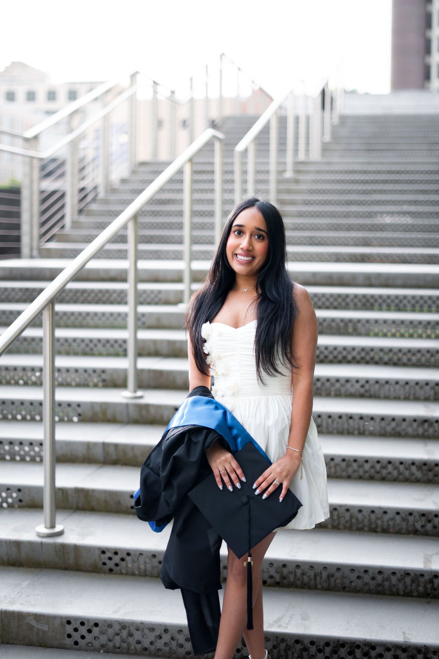 Georgia State graduation photos in front of the library bridge plaza, one of the best spots on the Atlanta campus