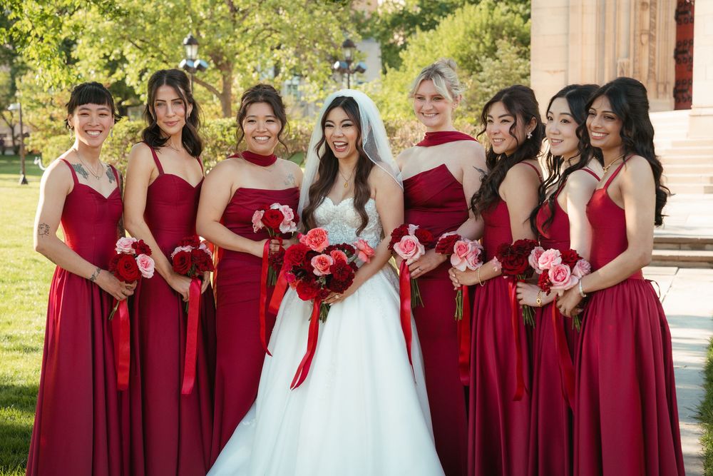 Bride posing with her bridesmaids during an outdoor wedding portrait in Pittsburgh.