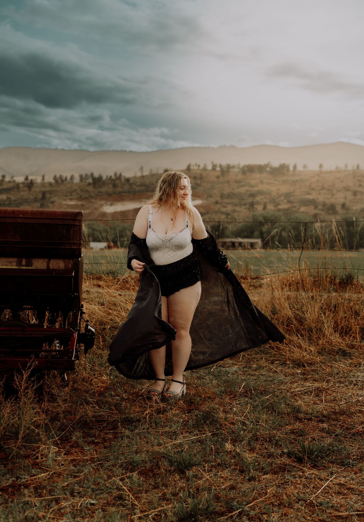 Woman walks away for dramatic, cinematic, portrait, and modeling photos in Fort Collins, Colorado