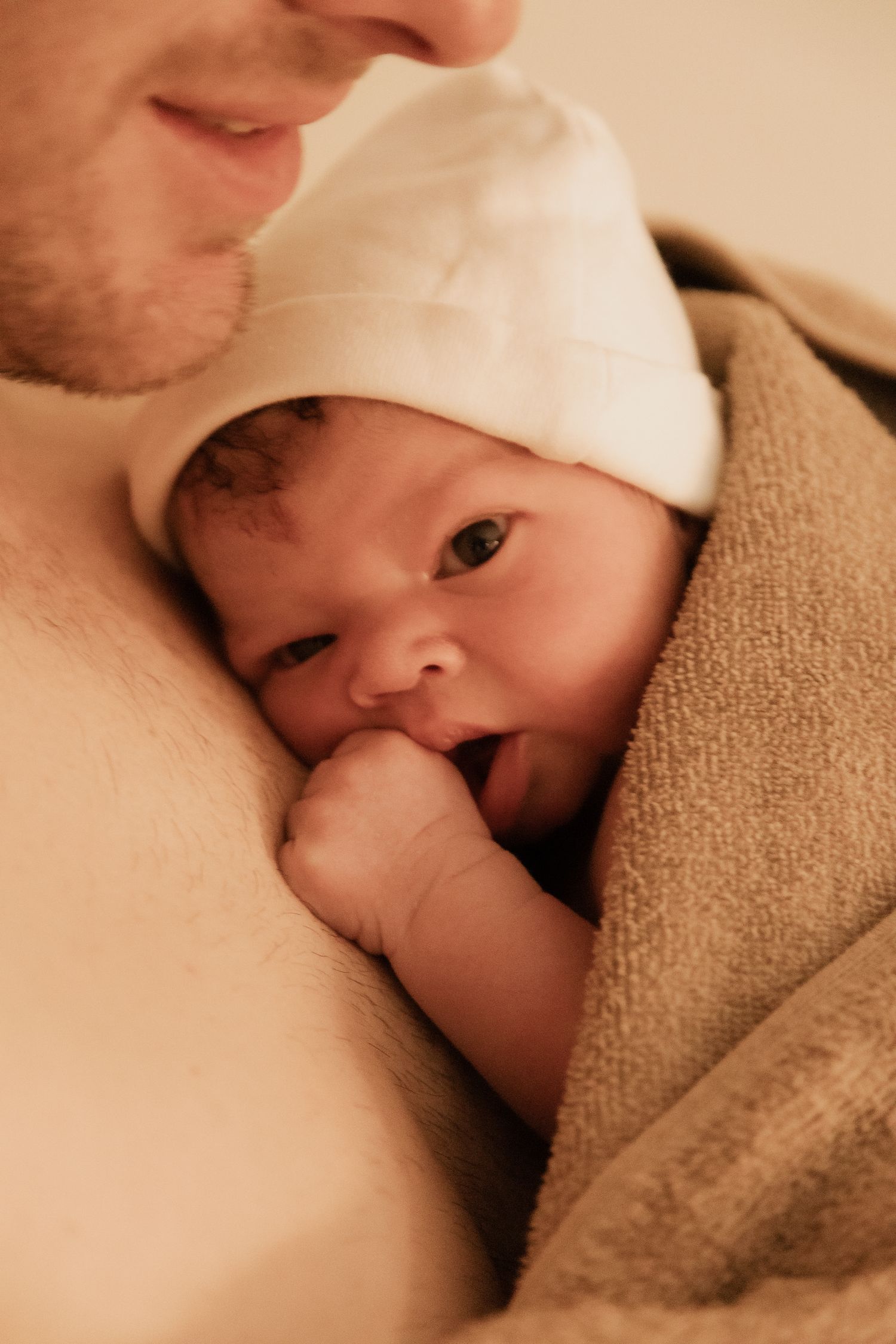 Emotional birth photography in Johannesburg showing skin-to-skin contact, newborn bonding, and the power of childbirth.