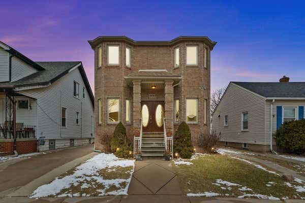 Brick two story home with columned entrance on Chovin Street Dearborn Michigan