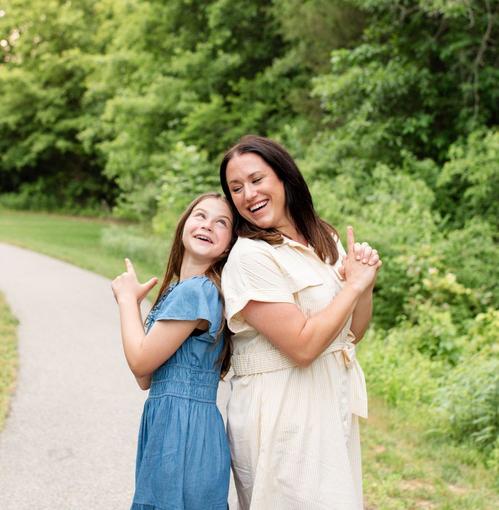 Mom with daughter during lifestyle family session in O'Fallon, MO.