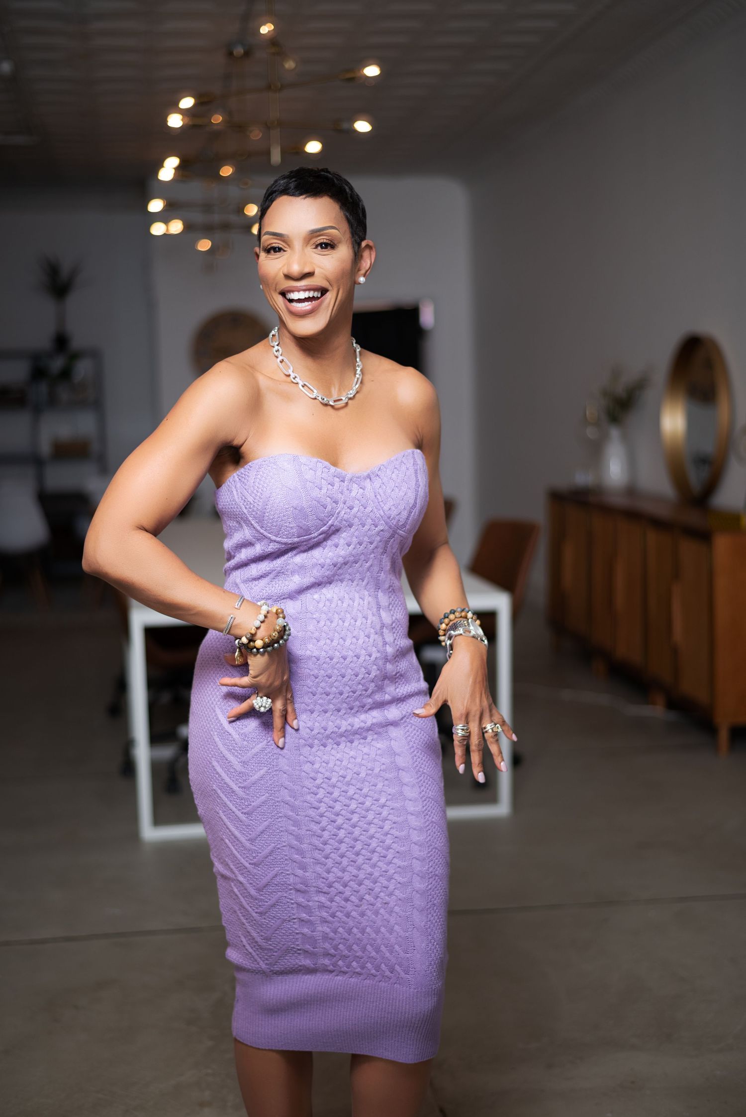 A strapless purple textured bodycon dress shown in multiple angles against a white studio background.