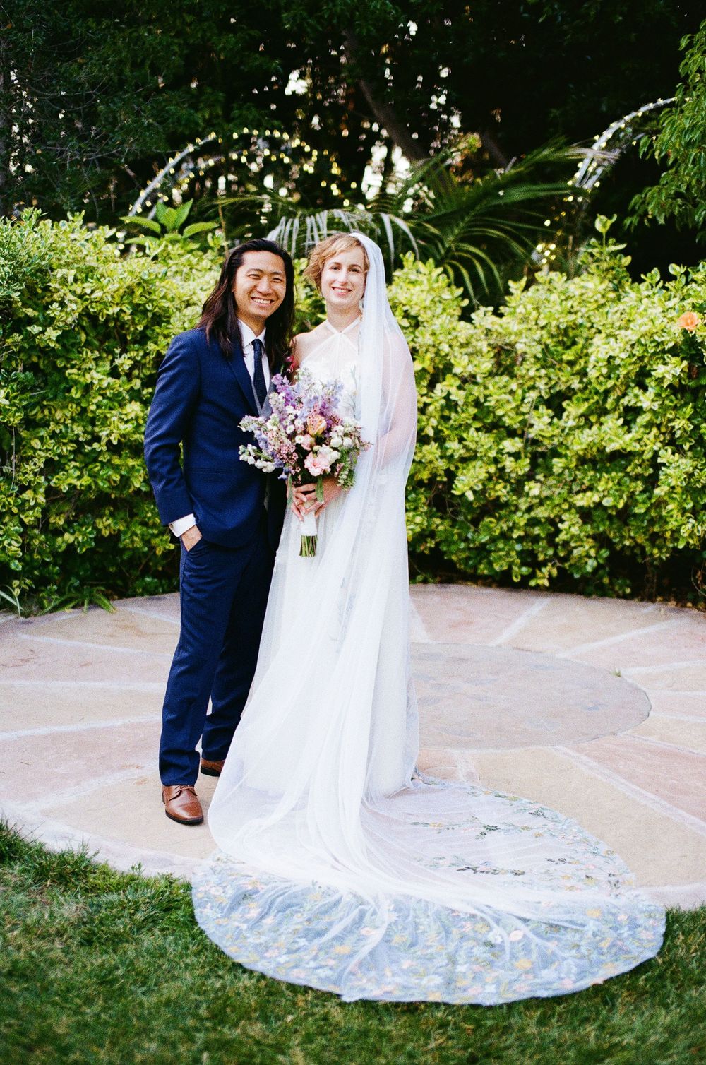 Raw, emotional moment between a couple at a backyard wedding in North Carolina, hybrid film and digital coverage.