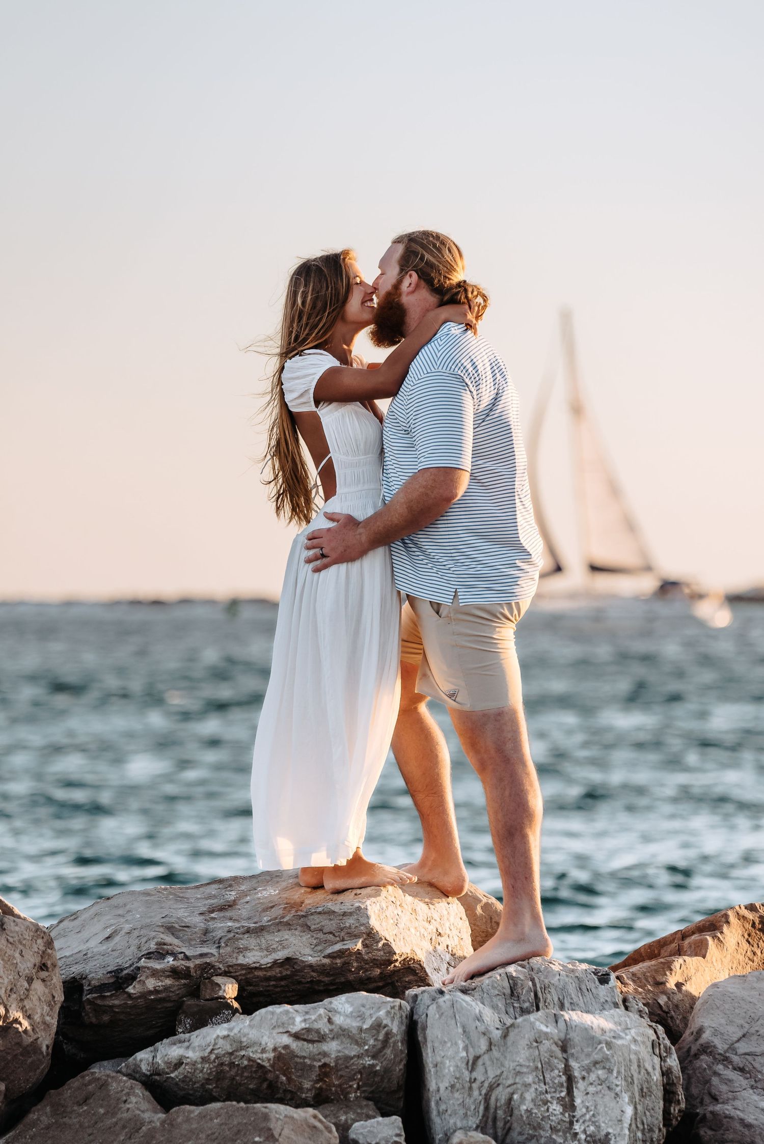 Destin Beach Engagement proposal photographer on the emerald coast captures couples photos during sunset. Miramar candid photography