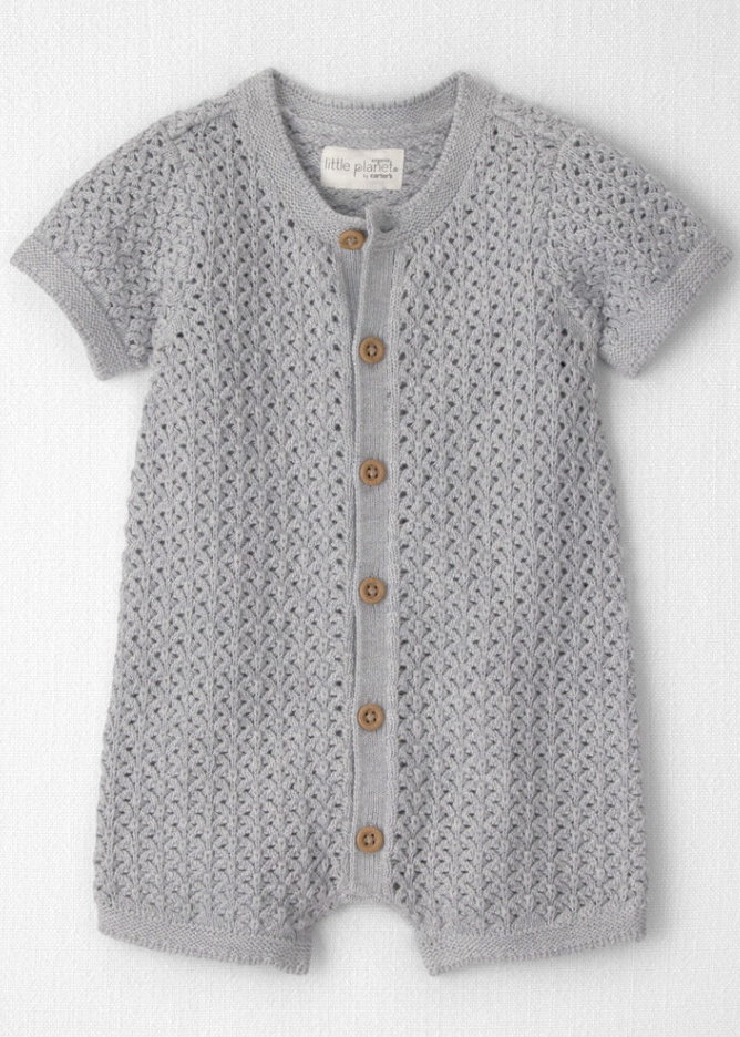 Gray knit baby romper with short sleeves, wooden buttons, and open-weave texture pattern.