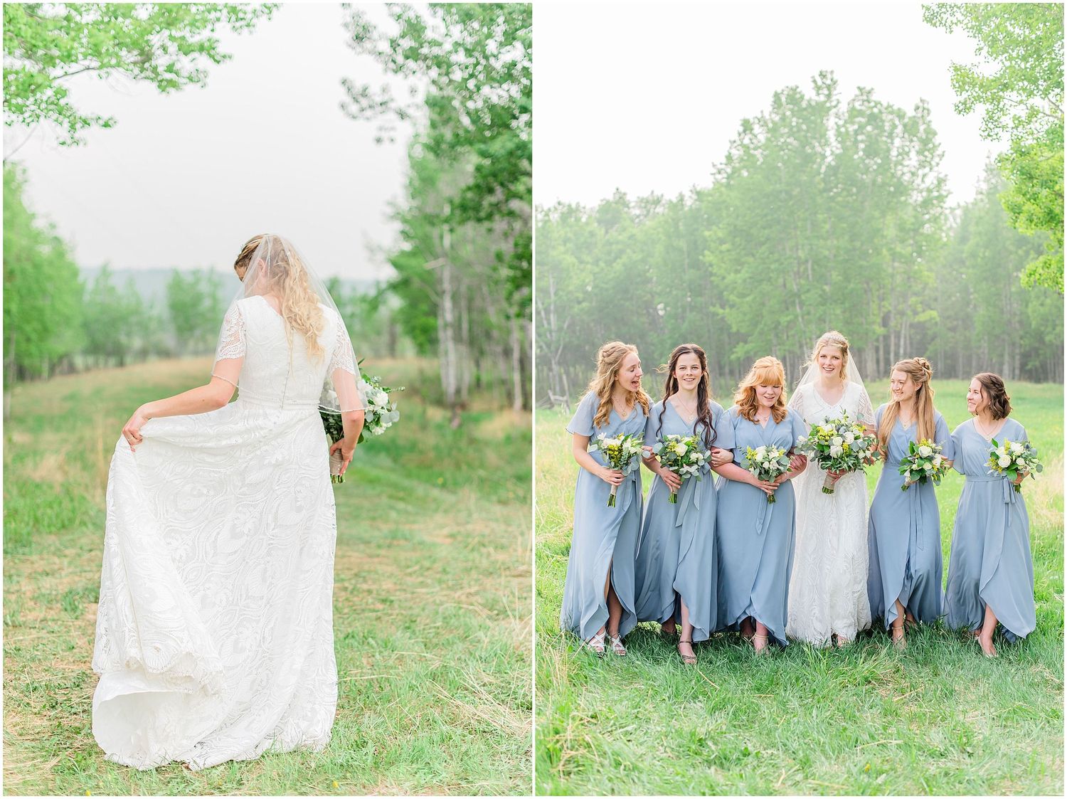 Bride in lace gown holds her train as bridesmaids in dusty blue dresses walk together in a green field.