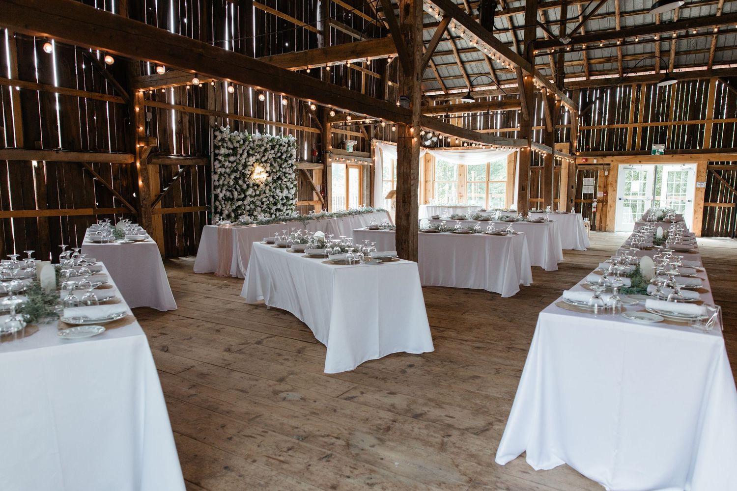 Rustic barn wedding floor plan showing balanced seating arrangement designed for smooth guest movement and visibility.