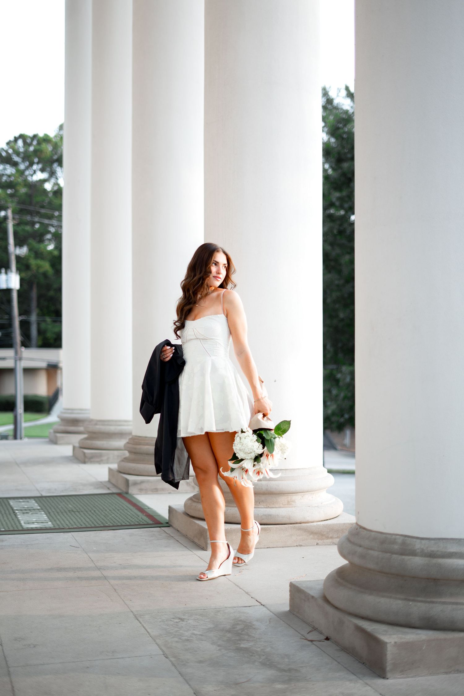 Emory graduation photos at glenn church stairs with pillars by Pierre, Atlanta Graduation Photographer