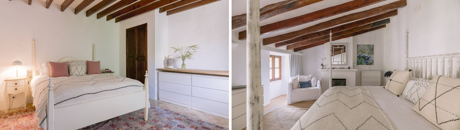 Bright coastal bedroom interior with exposed wooden beams and white bedding in a modern Mediterranean style.