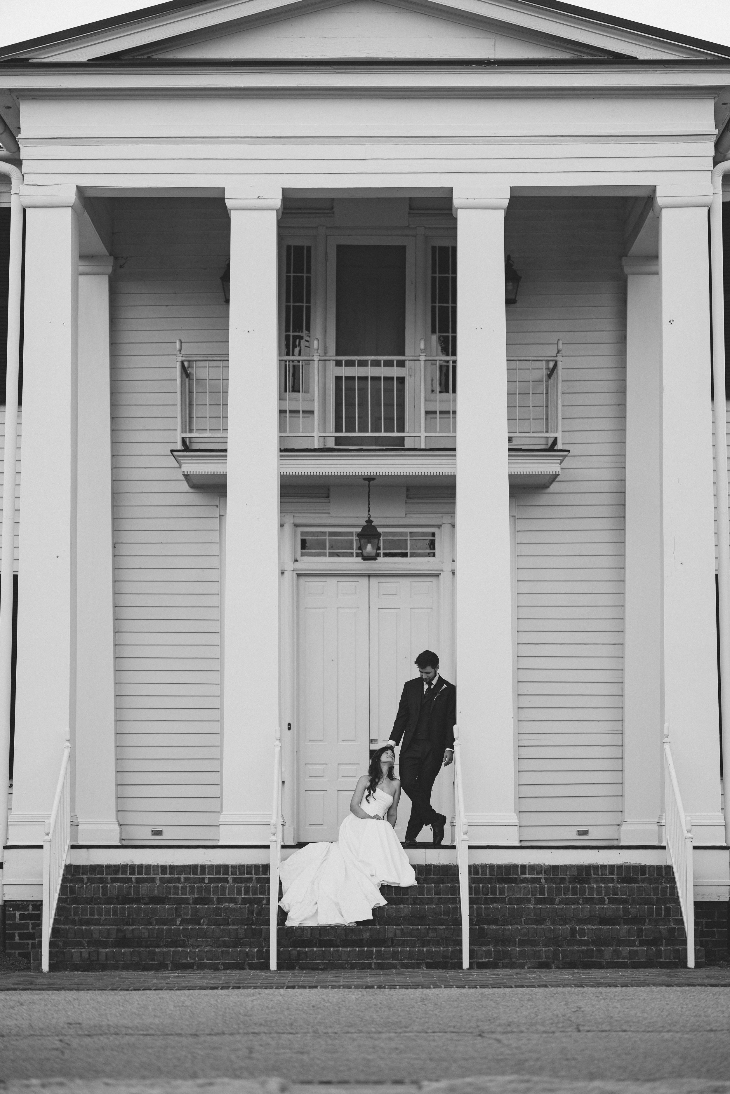 A sequence of five black and white photographs showing a white columned porch entrance with figures appearing in different positions.