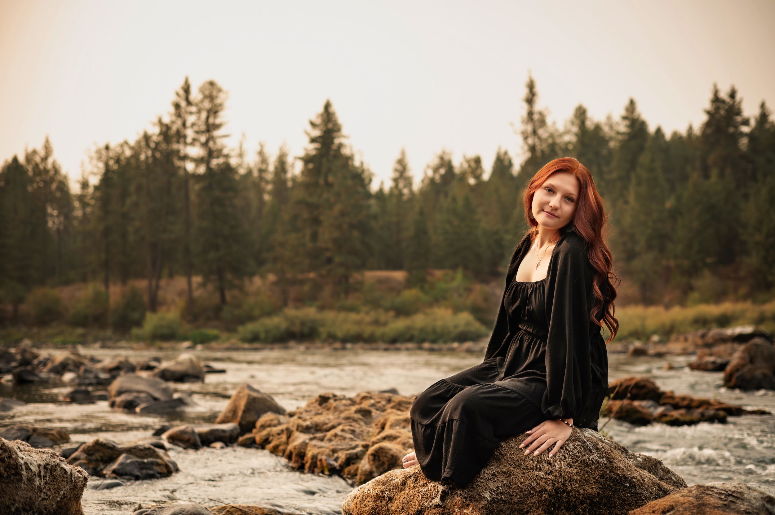 Senior portrait Riverside State Park dreamy golden light.