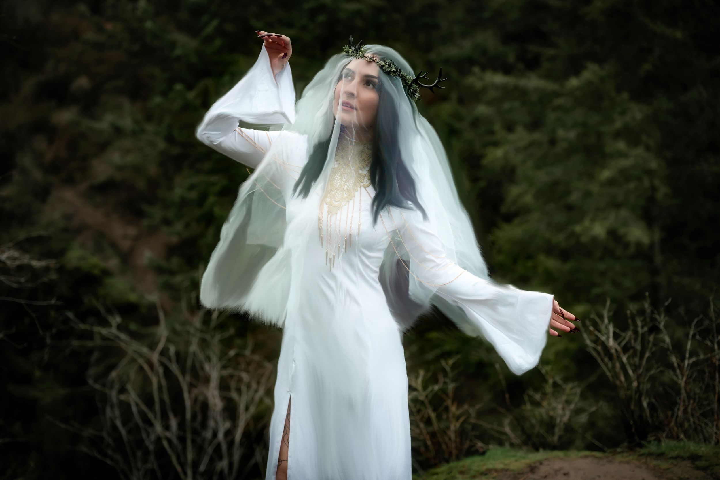 Winter Fantasy photograph ethereal ghostly witch in white at Indian Canyon in Spokane Washington.