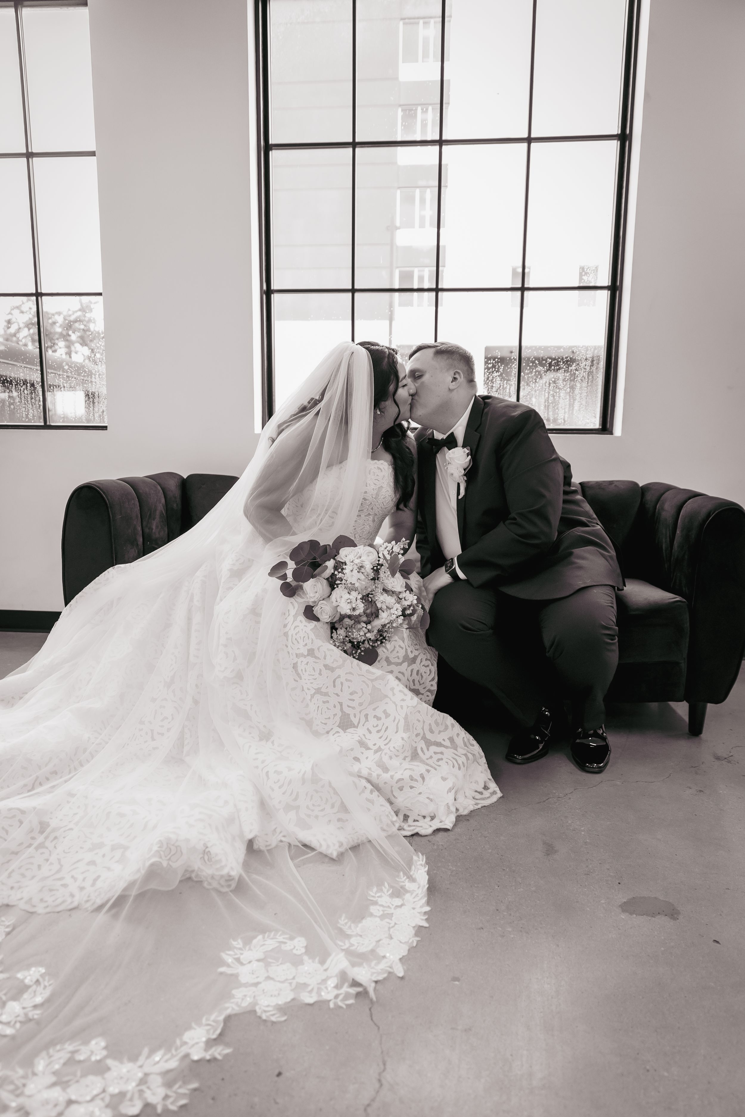 Wedding and elopement gallery features text overlaid on blurred romantic details with flowers and perfume bottles.
