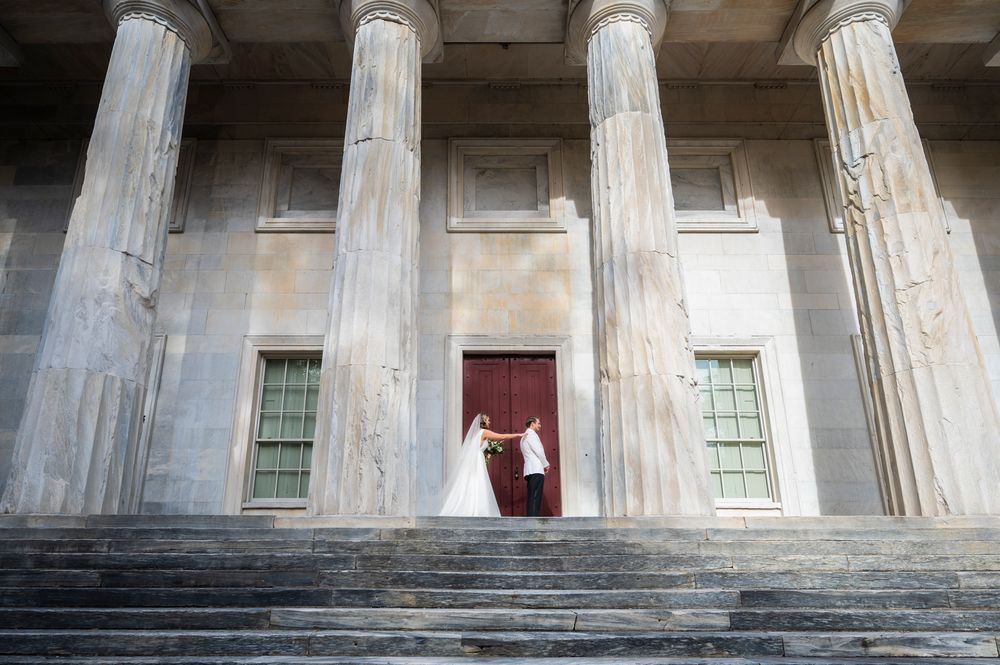 Row of majestic white stone columns at a neoclassical building entrance of the 2nd Bank Building in Philadelphia