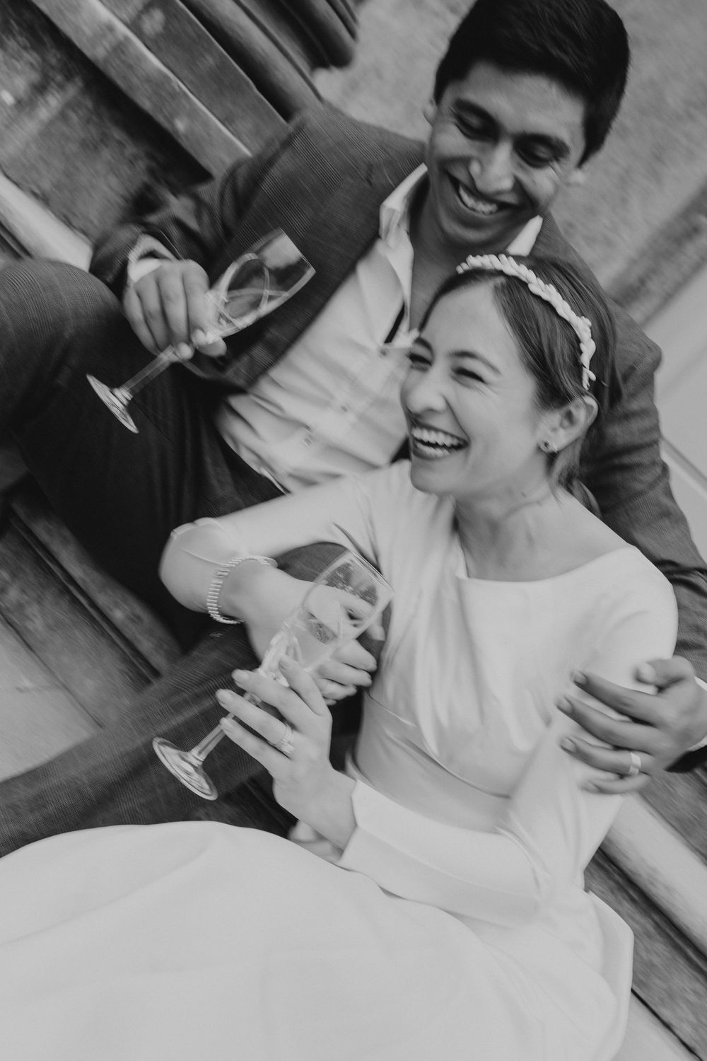 Relaxed couple celebrating after their wedding ceremony photographed in a natural documentary style