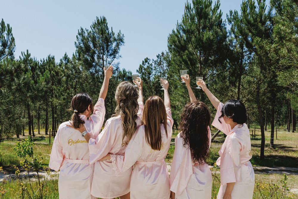 Bride with bridesmaids at Craveiral Farmhouse in Alentejo