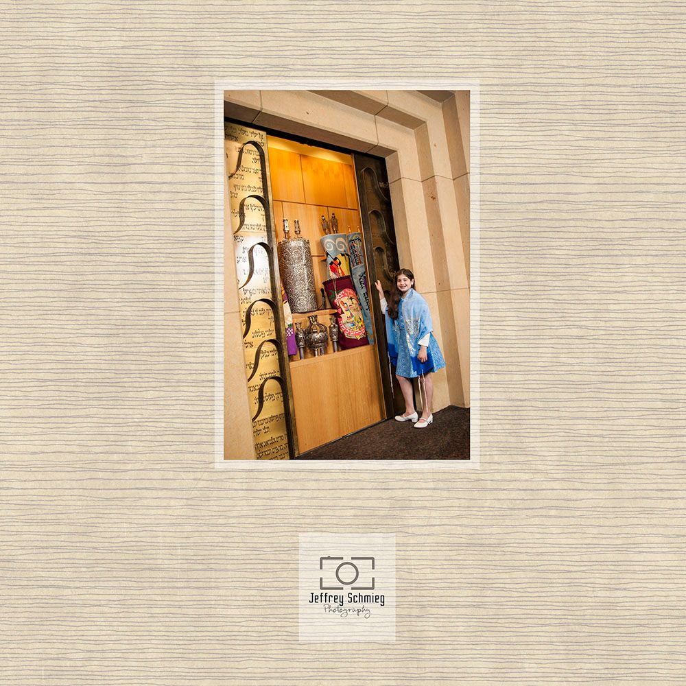 Guitar cases and musical equipment displayed against a beige wall in a hallway.