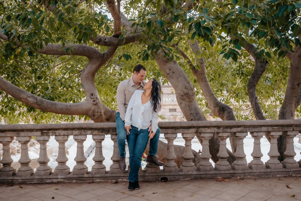 Joyful candid near palm trees Ciutadella Engagement photoshoot Barcelona BarcelonaLoversPH