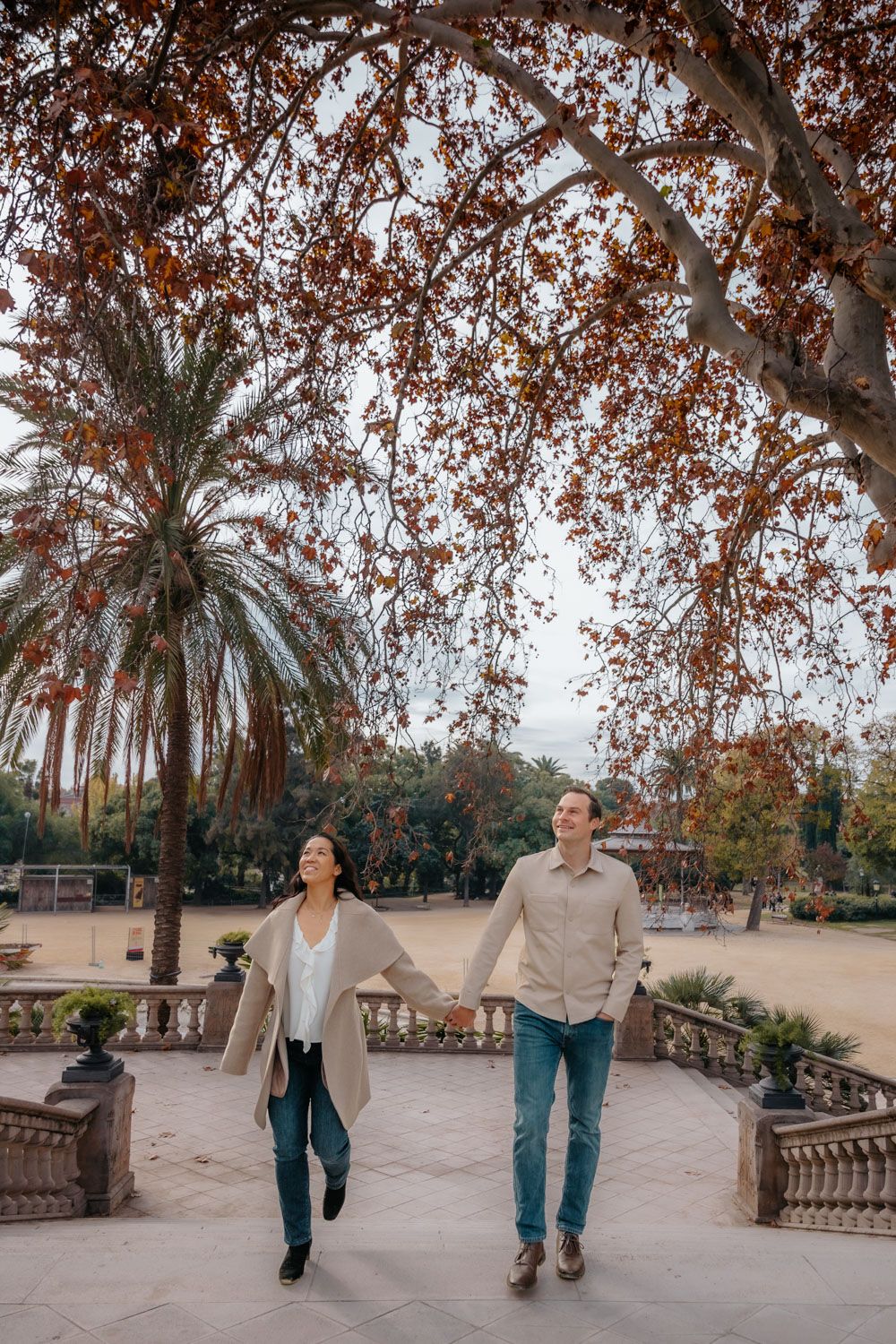 Playful spin near fountain Barcelona Engagement photoshoot Barcelona BarcelonaLoversPH