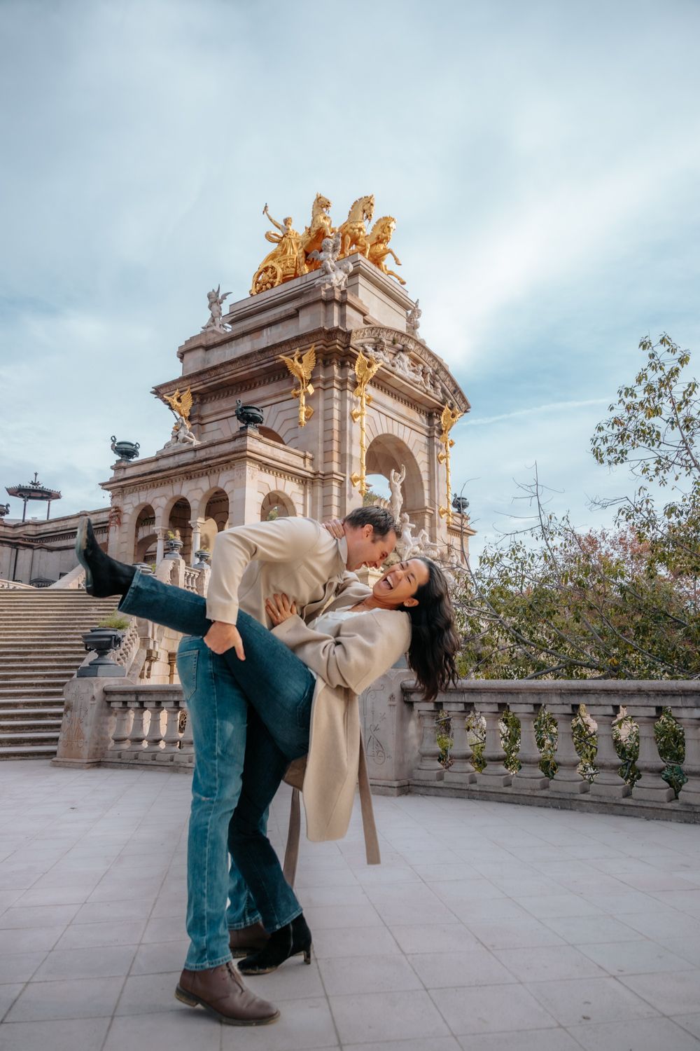 Joyful hug near Cascada Monumental Barcelona Engagement photoshoot Barcelona BarcelonaLoversPH