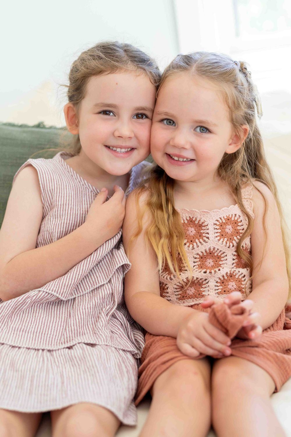 Siblings in mid-morning light during an outdoor family photography popup in Perth