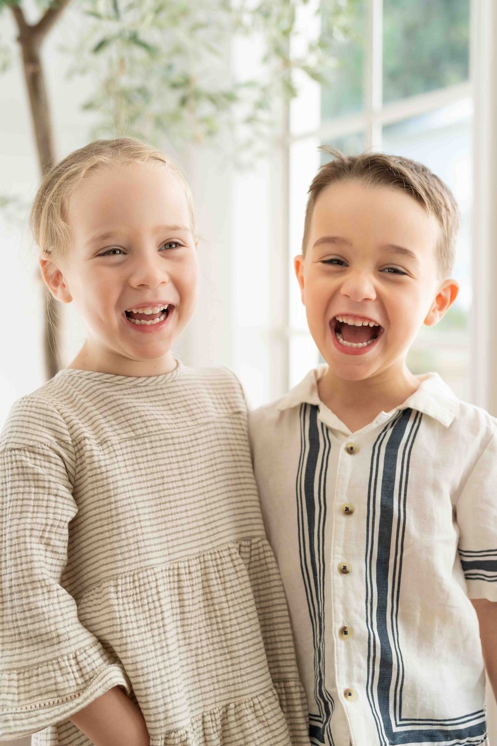 Sibling portrait in mid-morning light during an outdoor family popup session in Perth