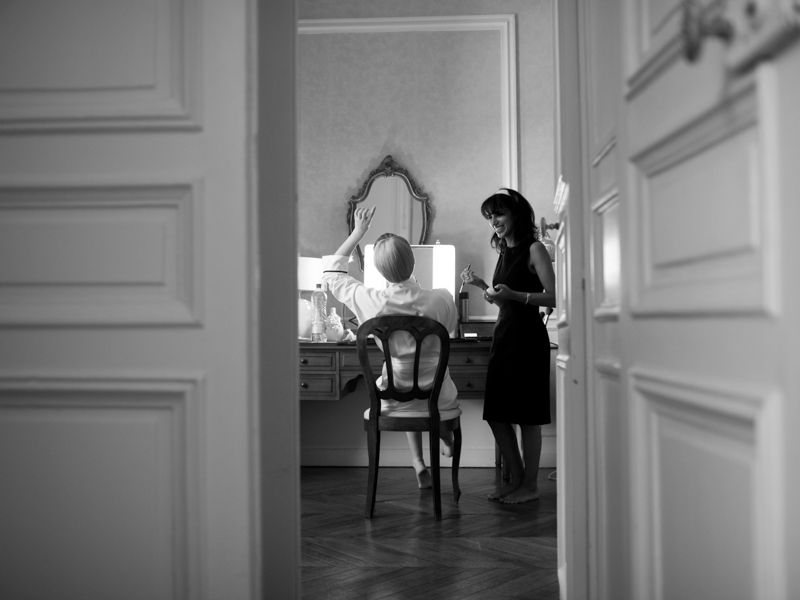 Bride getting ready inside Château de Santeny before her wedding ceremony near Paris