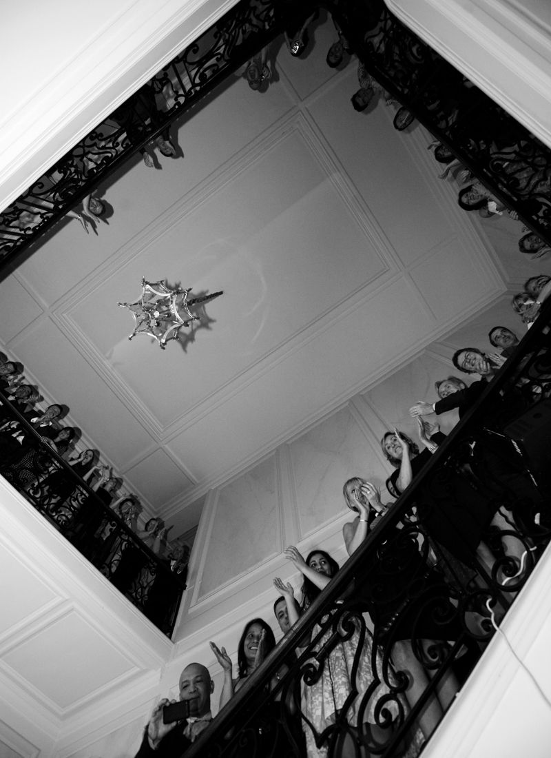 Grand staircase inside Château de Santeny during a wedding celebration