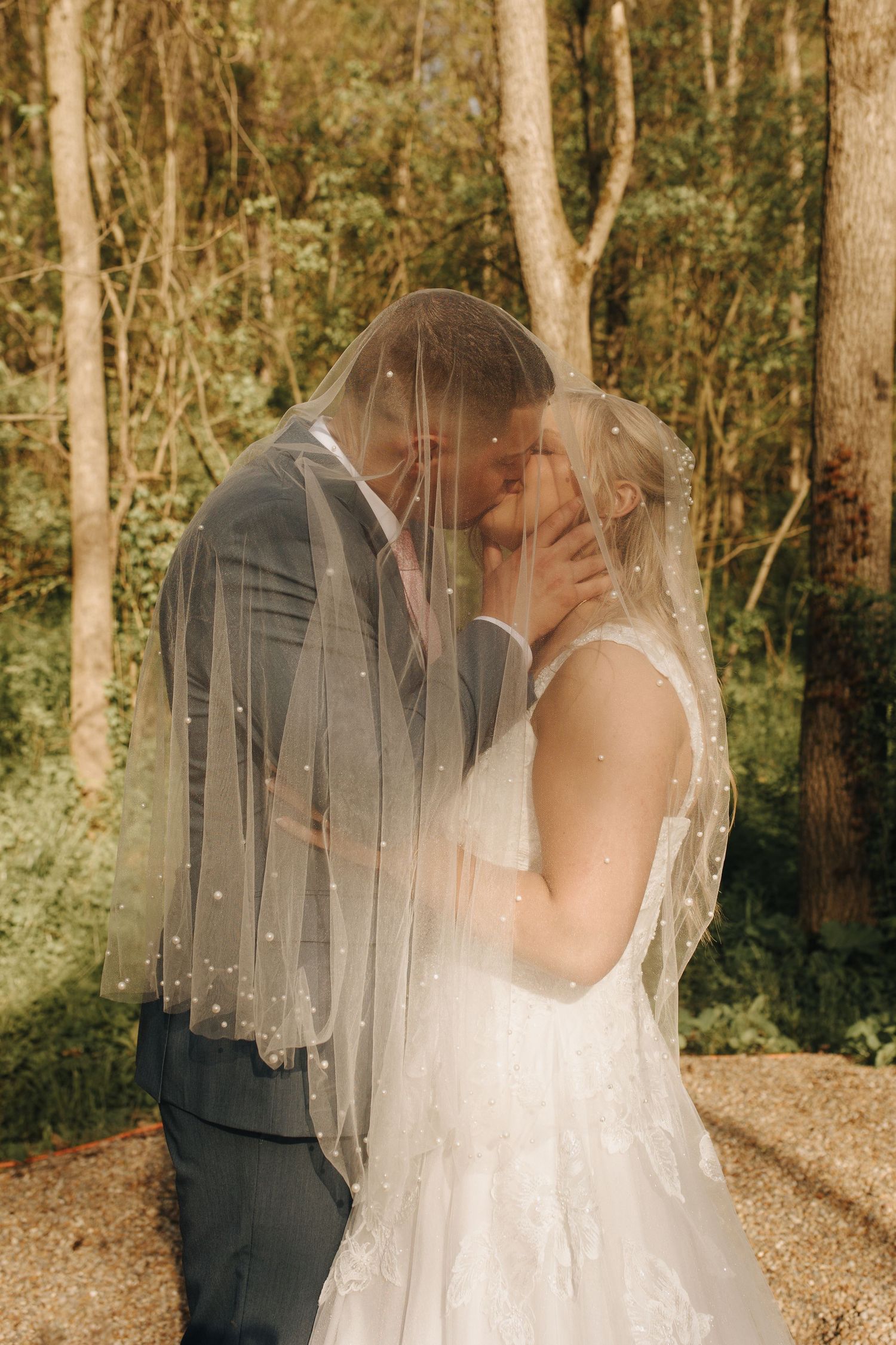 A passionate kiss shared between newlyweds after their Mansfield, Ohio winery wedding.