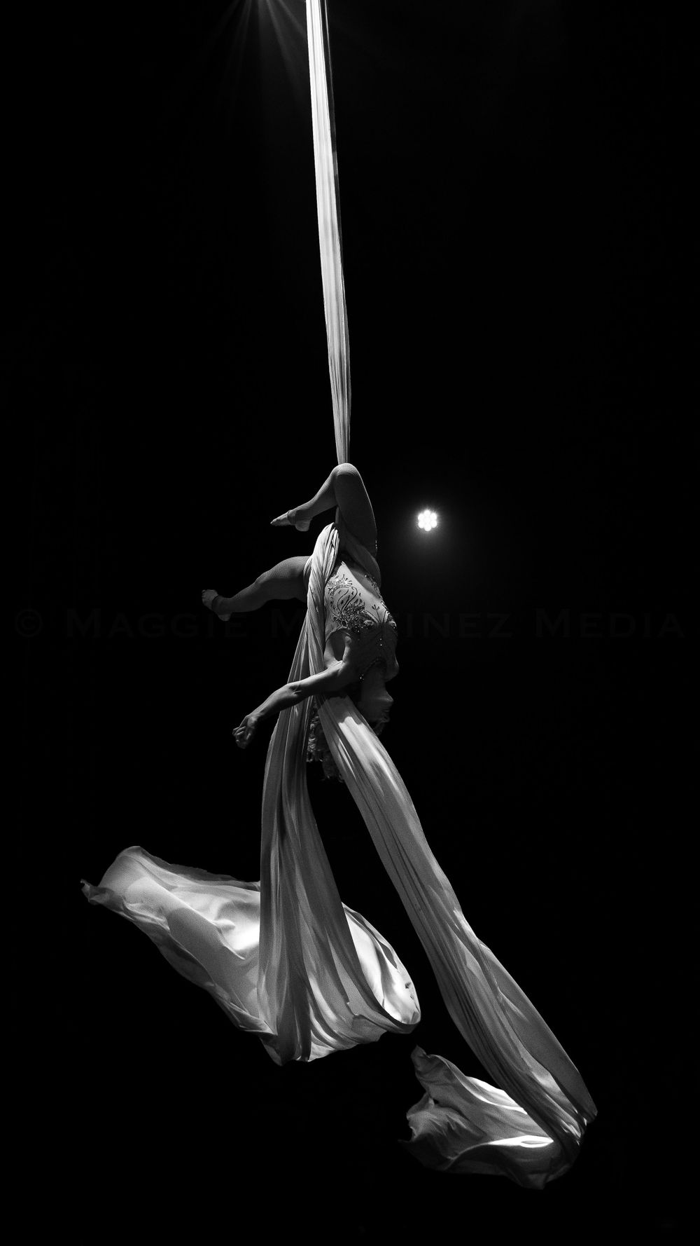 Aerial silks artist Allison Blei performs in Sarasota, Florida at Mr. Swindle's Traveling Peculiarium