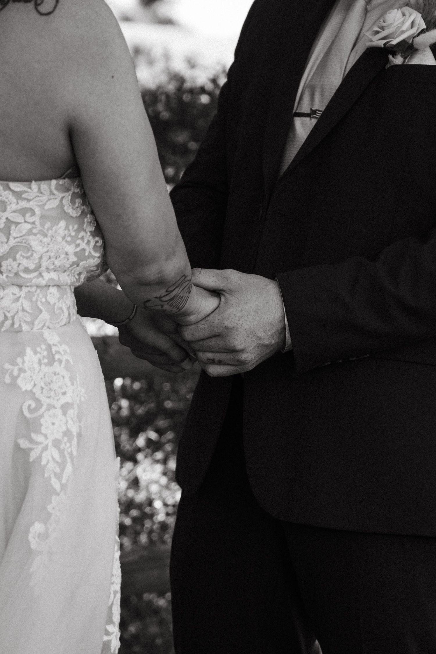 Close-up details of a bride and groom's intimate wedding ceremony.