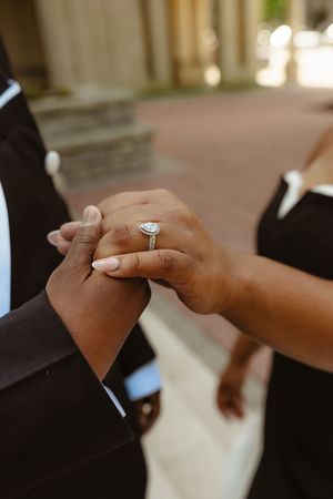 A series of close-up shots showing hands exchanging an engagement ring during a romantic proposal moment.