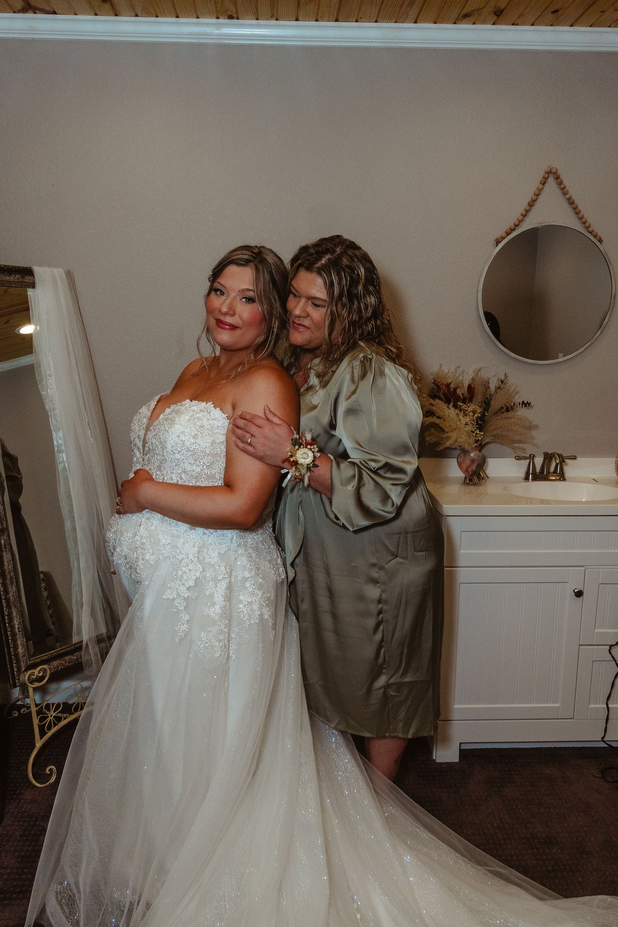 Intimate bridal portrait in a rustic room with natural lighting.
