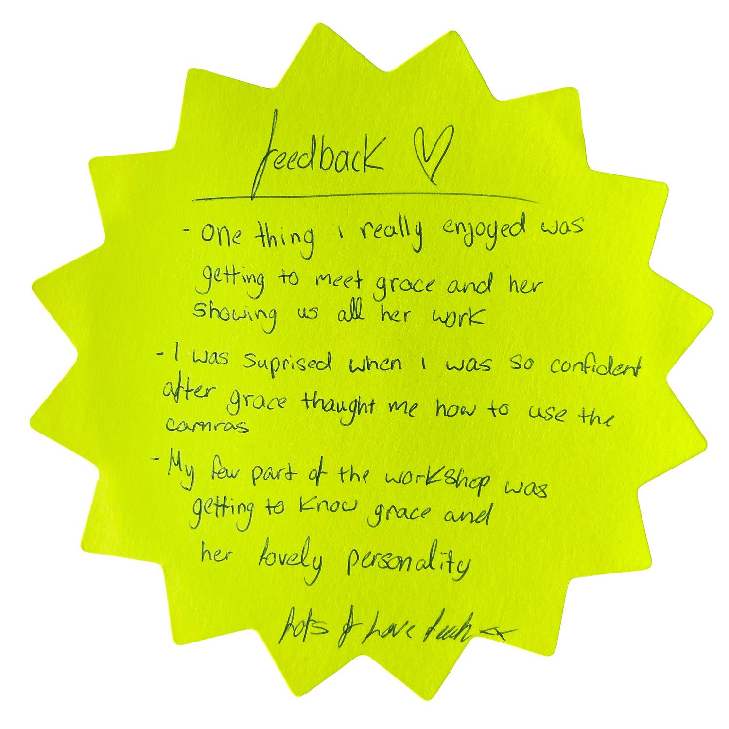 Yellow star-shaped sticky notes with handwritten feedback displayed on white surface.
