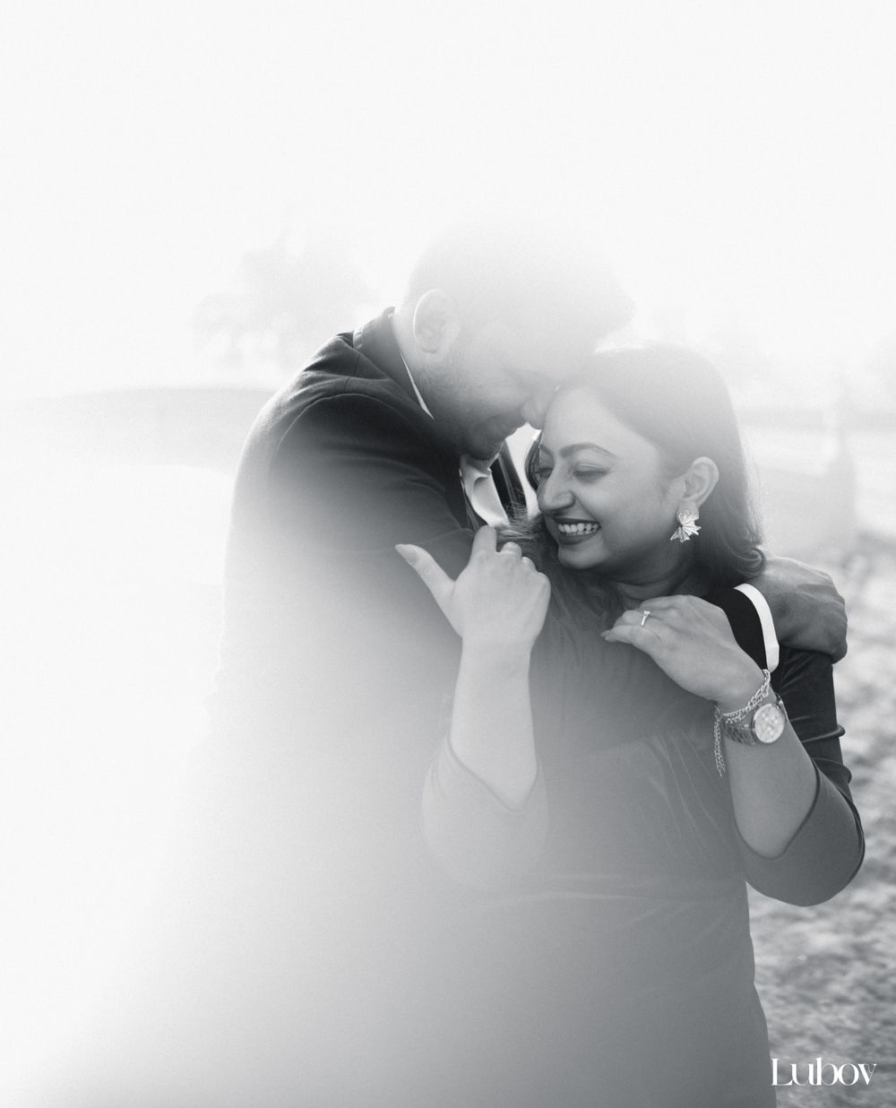 Intimate black and white moment captured during golden hour photoshoot.