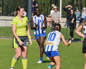 Melbourne sports photographer, AFLW, North Melbourne, Carlton