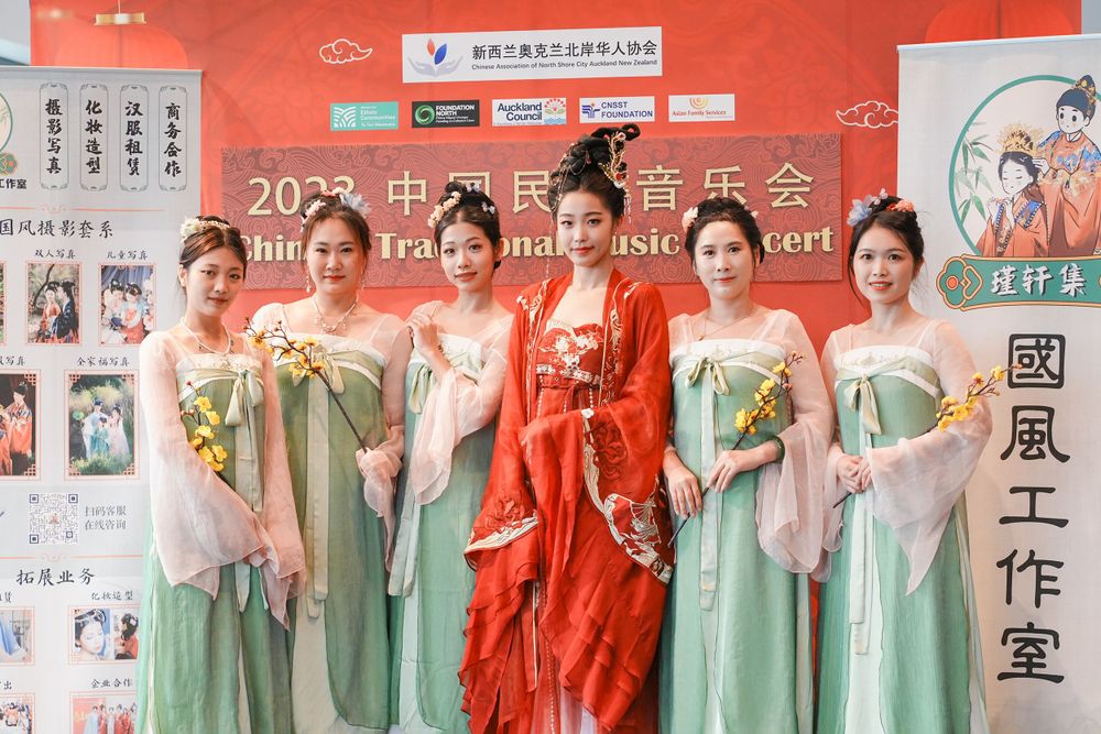 Group photo of performers in Hanfu at a Chinese Traditional Music Concert, captured by an Auckland event photographer.