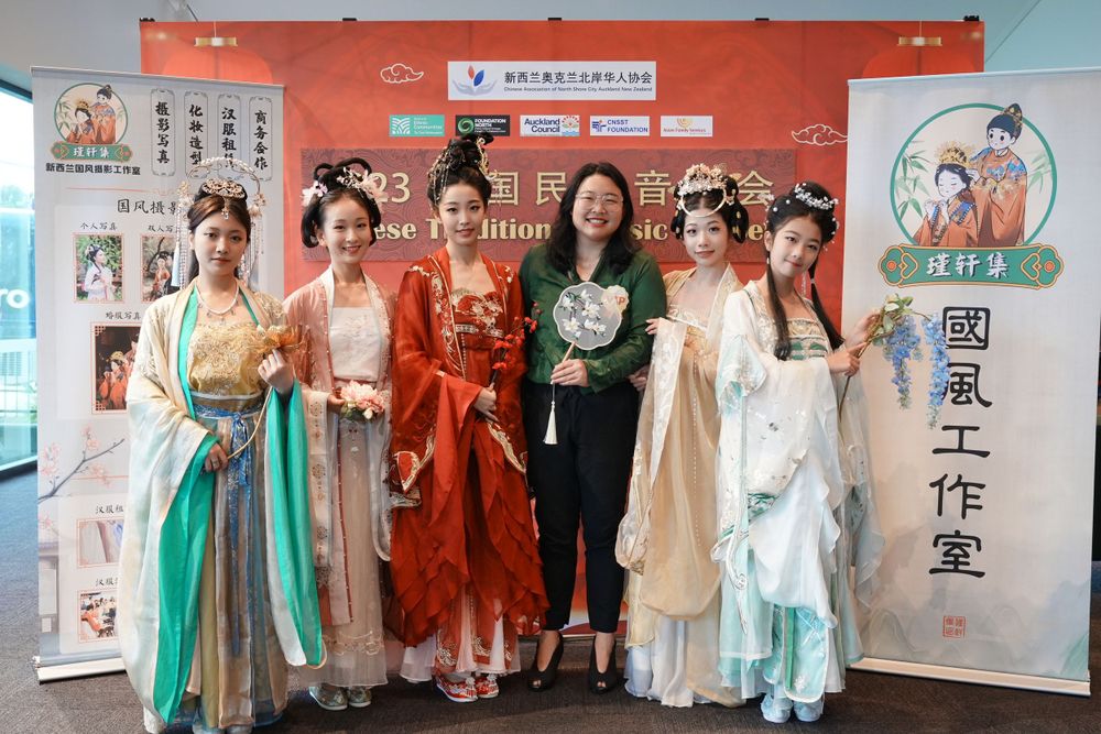 Group photo of performers in Hanfu at a Chinese Traditional Music Concert, captured by an Auckland event photographer.