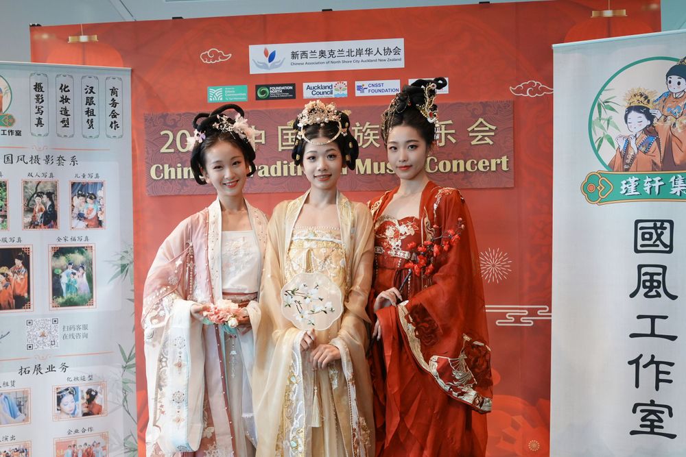 Group photo of performers in Hanfu at a Chinese Traditional Music Concert, captured by an Auckland event photographer.