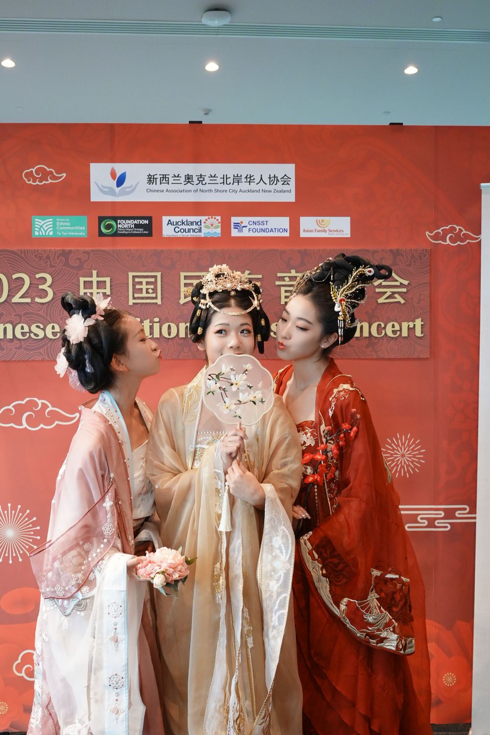 Group photo of performers in Hanfu at a Chinese Traditional Music Concert, captured by an Auckland event photographer.