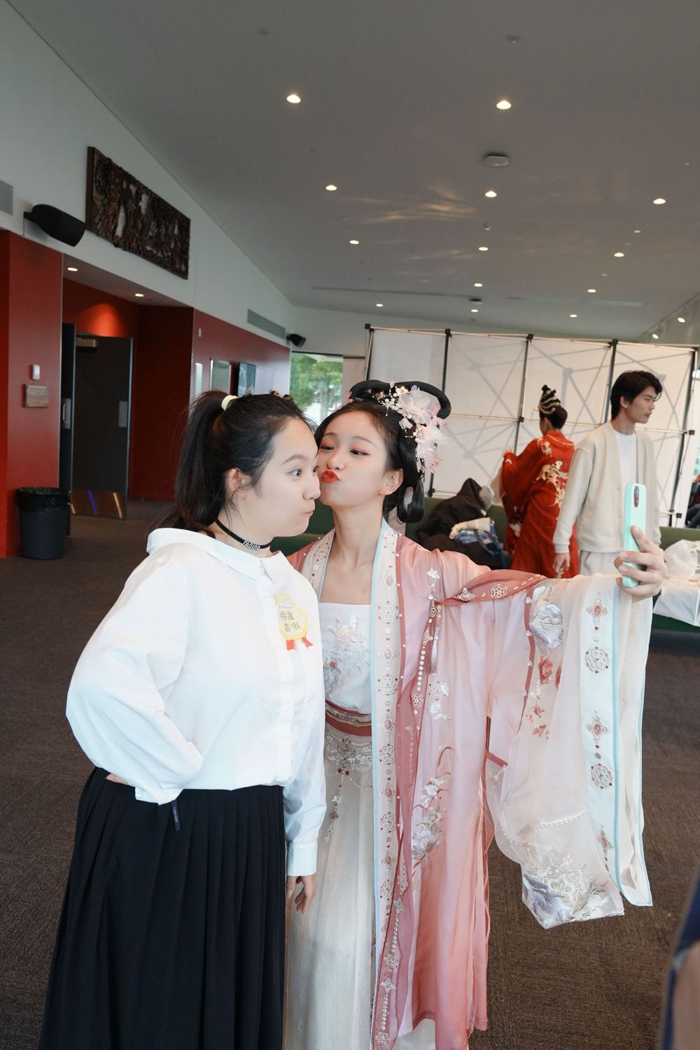 Event photography of a traditional Hanfu dance performance on stage at the Dragon Boat Festival, by an Auckland event photographer.