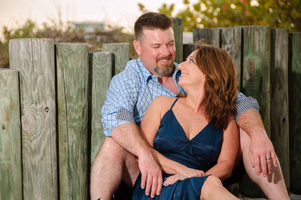 photo of couple sitting on boardwalk in new port richey