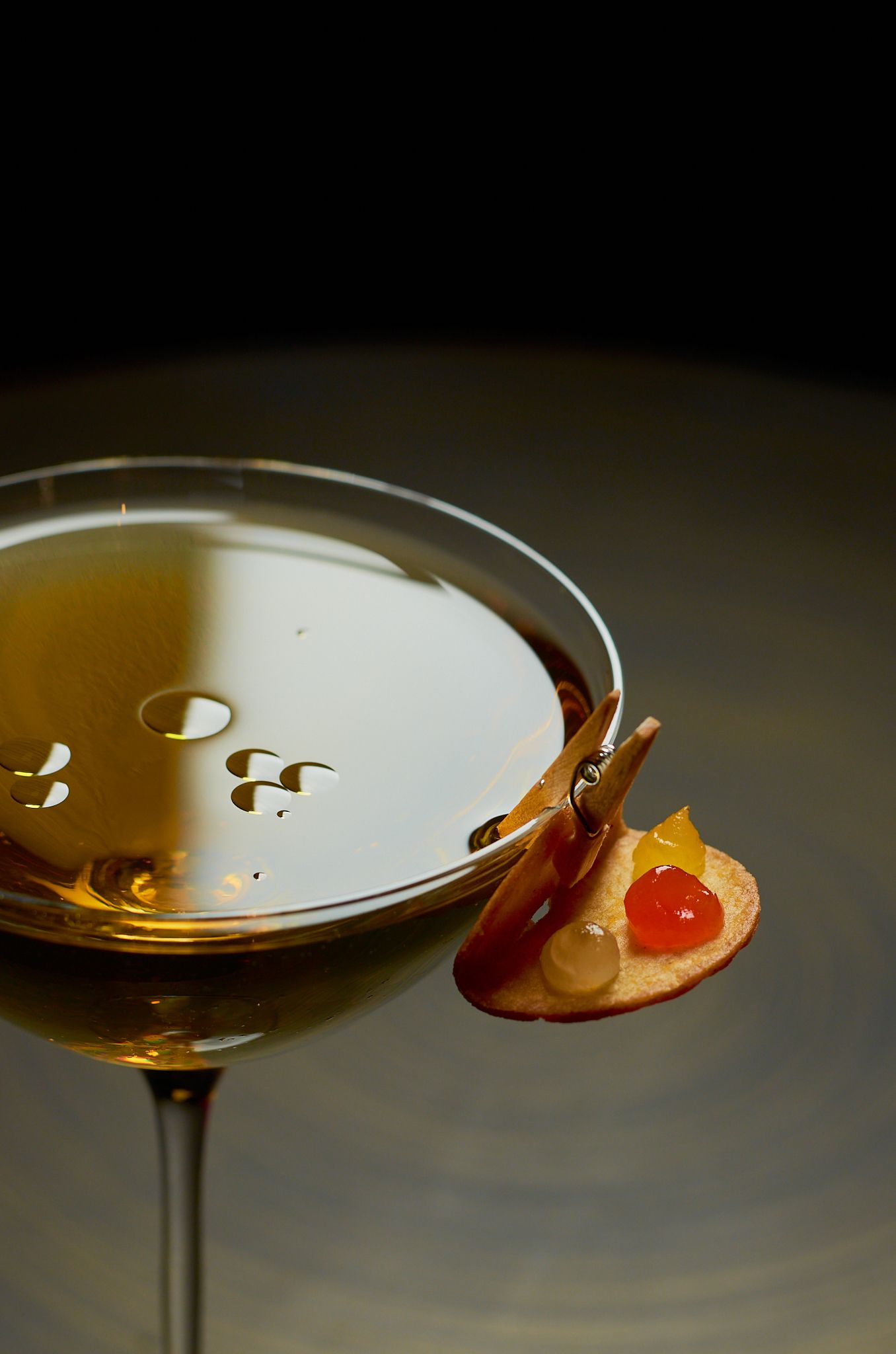 Sophisticated cocktail with a tiny taco clipped to the glass. Gustavo Lopez Photography. Nashville Food Photographer.