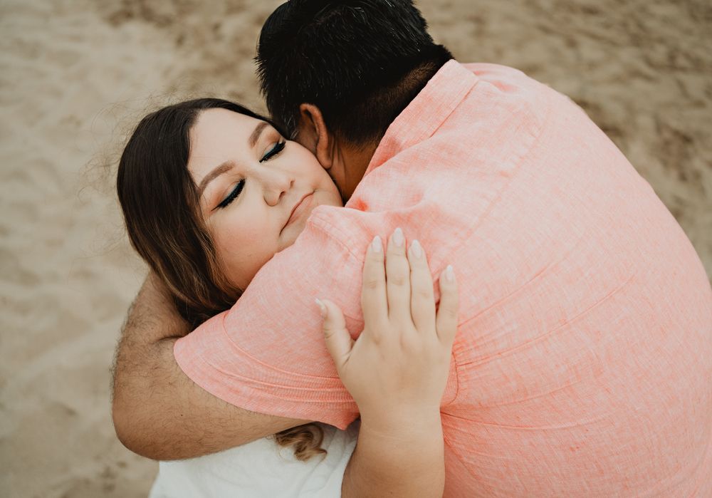 In an embrace, bride calm