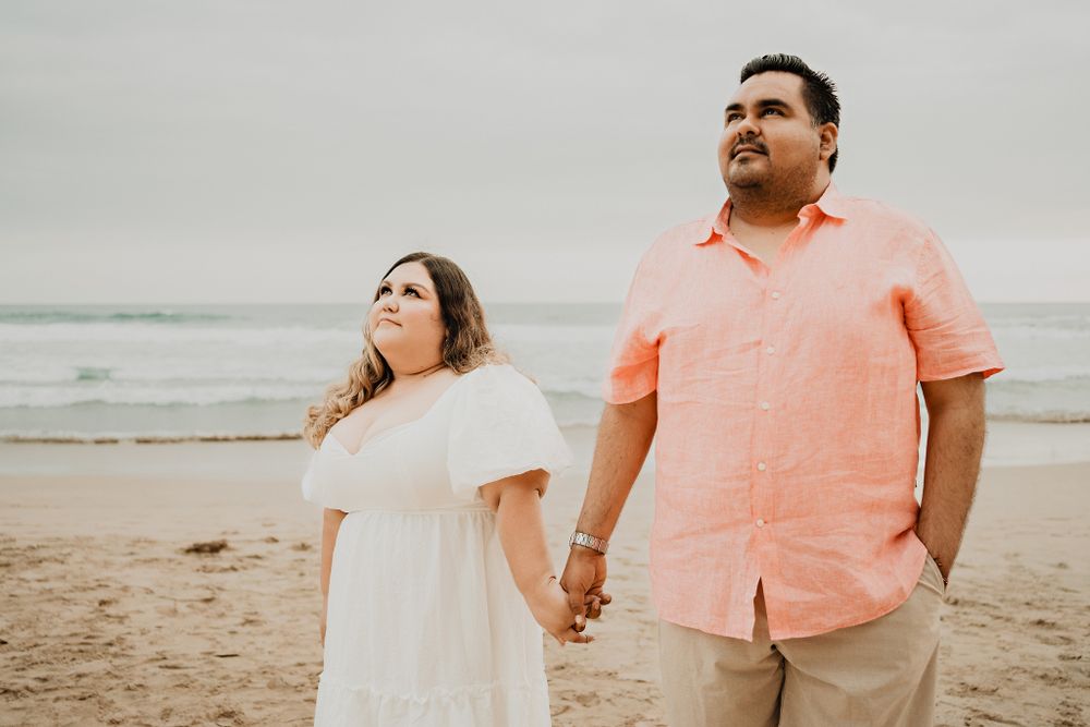 Holding hands, looking at the sky