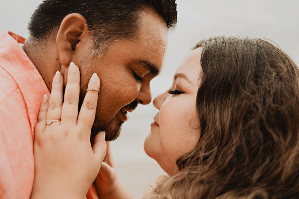 Nose to nose, romantic, hand on cheek